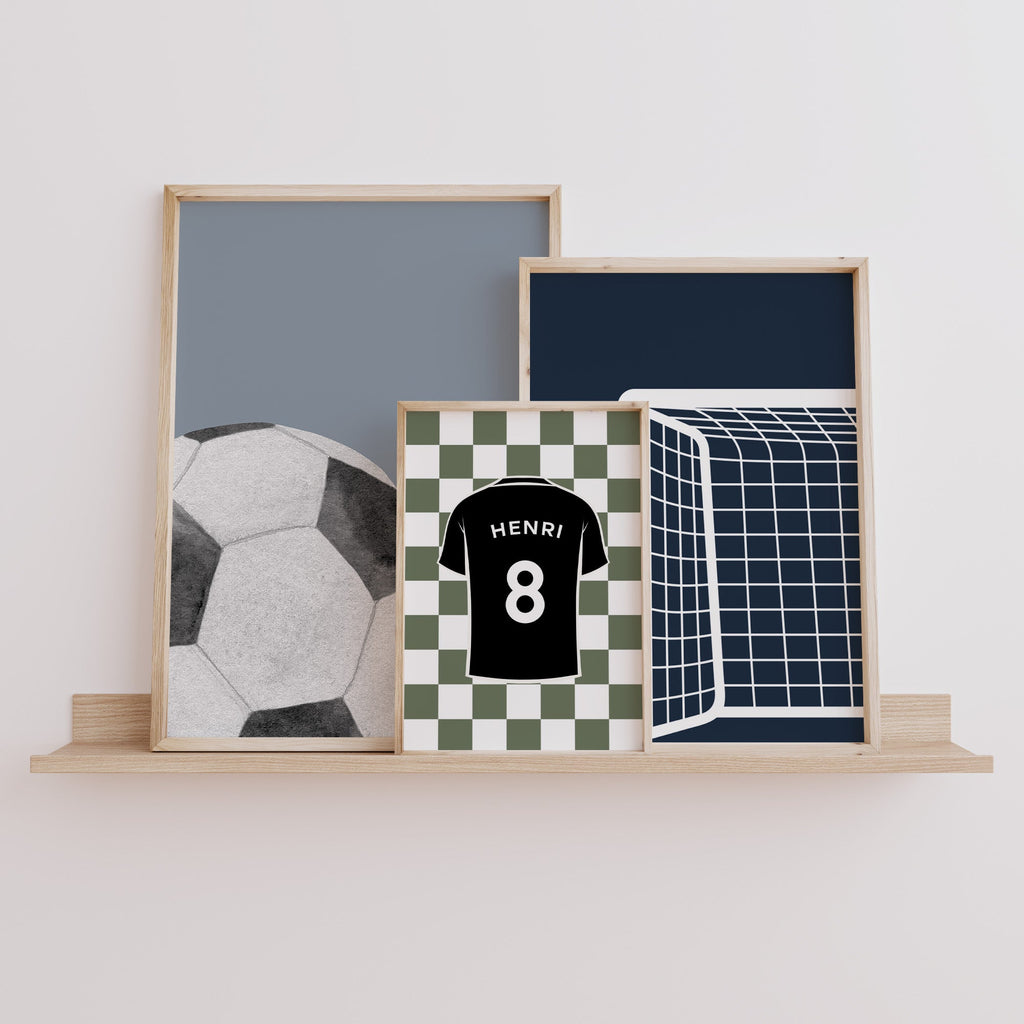 Personalised Football Prints Set of 3, Navy Boys Wall Art shown in a styled room