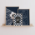 Personalised navy football prints set of 3 displayed in a boys bedroom