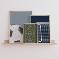 Football prints set of 3 in navy, olive and grey displayed in a boys bedroom